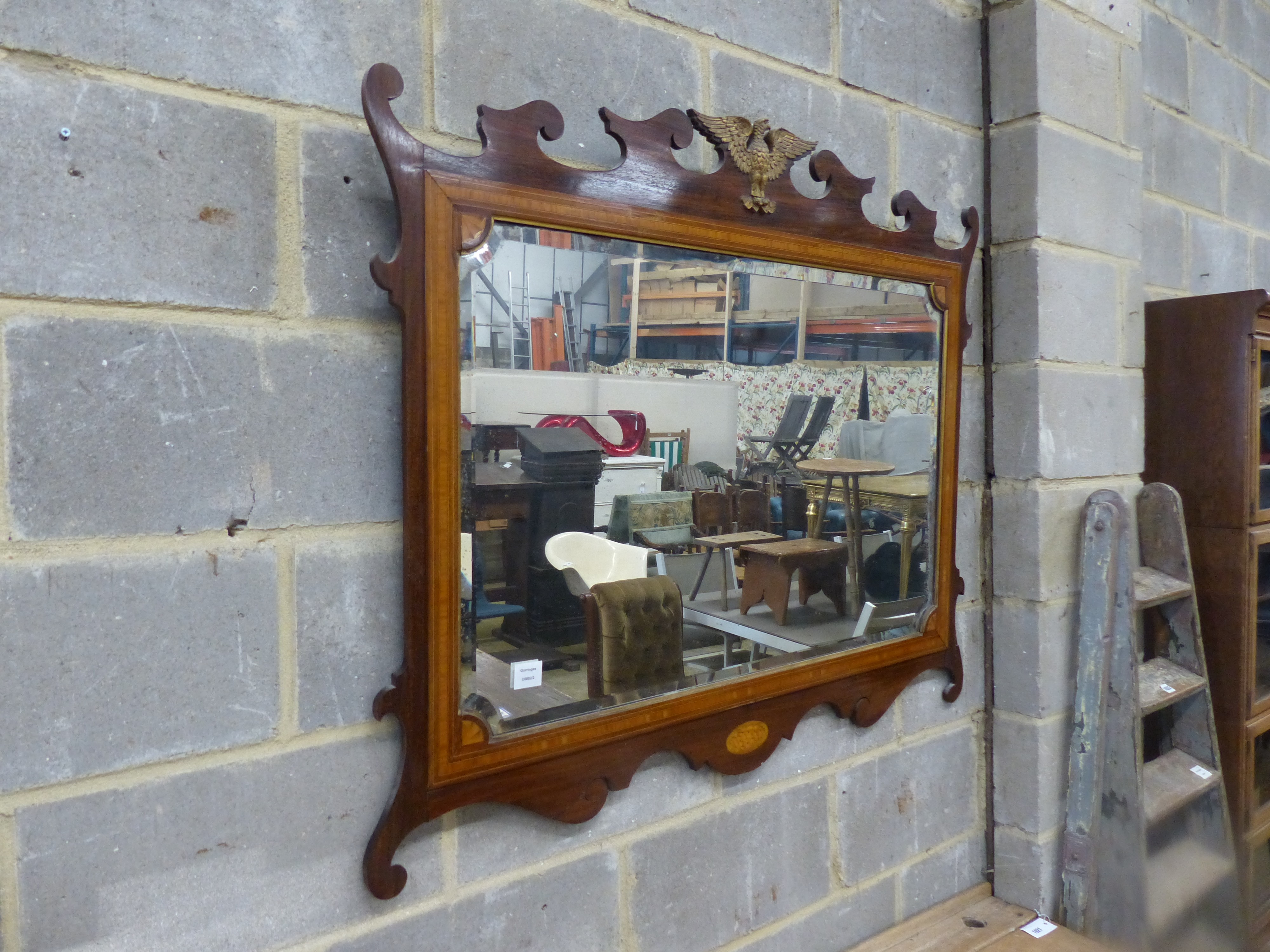 A Georgian style satin wood banded fret frame wall mirror. W-119, H-97cm.